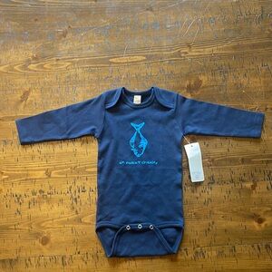 12-18 month Onsie with drawing of halibut with “ak sweet cheeks” written on it